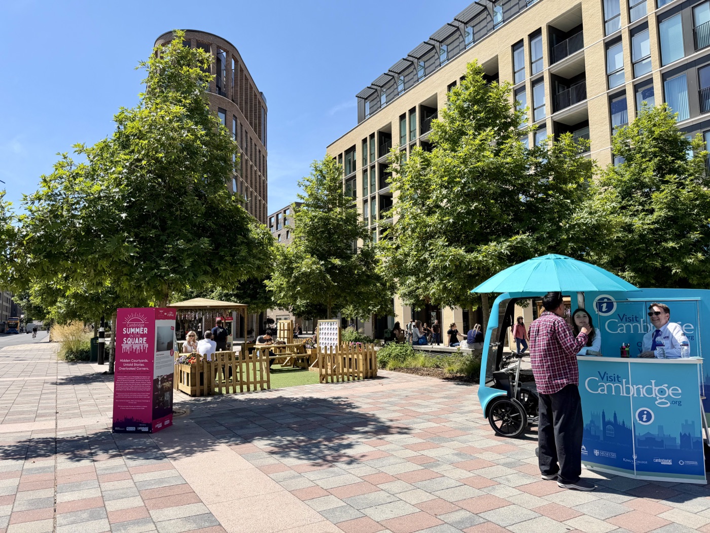 Station Square public realm on a summer afternoon
